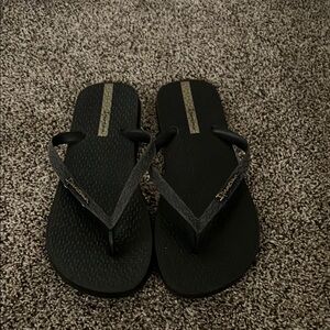 Havaianas Black Flip Flops with Gold Logo
